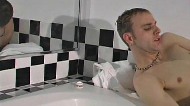 After 21 year old Calib Cox gets naked, we can see what he has in common with horses, namely a very thick 8 inch cock! In this hot solo jerk off scene, he sits by the bath and strokes that big dick, while concentrating on getting hard and shooting