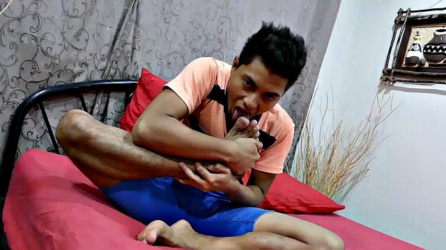 This horny looking Asian boy has about the hottest Asian feet you ever did see. Watch as Josh slides his shoes off and take in the sweet foot aroma by burying his face in his shoe. He begins to caress and lick his boy feet as he grows a boner.