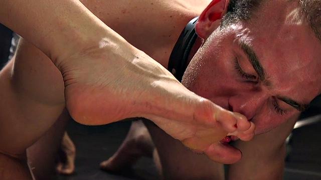 Pegging domina in heels whips and pegs her foot sub