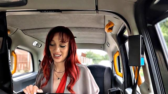 Redhead taxi babe fucked in car by taxi driver