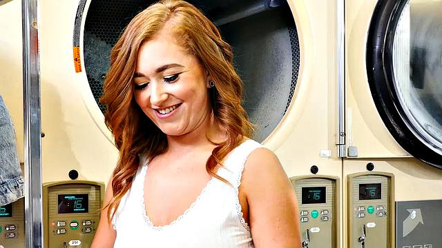 Thick and sexy redhead Callie Black gets hot cleaning her clothes