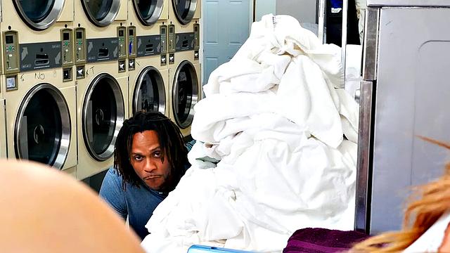 Thick and sexy redhead Callie Black gets hot cleaning her clothes