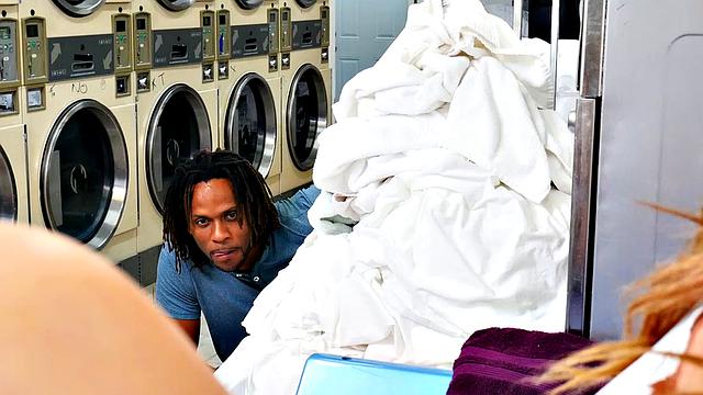 Thick and sexy redhead Callie Black gets hot cleaning her clothes