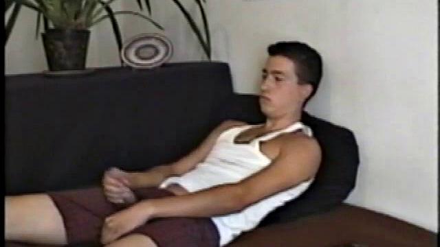 Logan gets on knees, pulls shirt up, yanks on cock. Then slips off boxers, thrusts butt in the air.