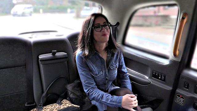 Watch this tattooed Spanish hottie take it from behind and get her ass drilled in the cab