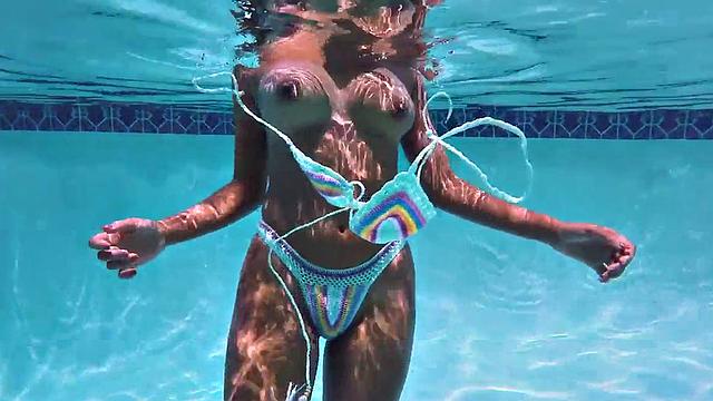 Oiled-up ebony babe with a big ass takes a hard pounding from BWC in her wet pussy hole