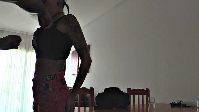 Tattooed babe fucks uniformed cop in doggy-style while riding him in reverse cowgirl