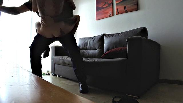 Tattooed babe fucks uniformed cop in doggy-style while riding him in reverse cowgirl