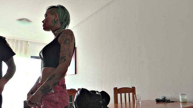 Tattooed babe fucks uniformed cop in doggy-style while riding him in reverse cowgirl