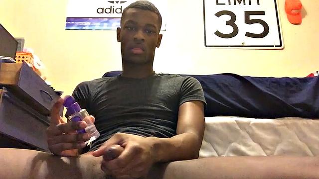 Ebony stud Chris Coleman is back for another session. This time, down on the floor, this young man delivers a hot stroke show that starts with his cock hanging out.