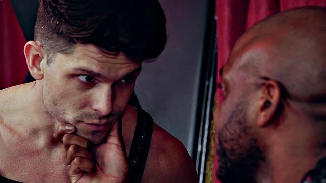 Ebony jock fists BDSM stud after whipping