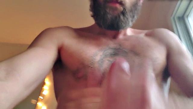 Bearded jock jerks and fingers his lubed asshole for cumshot
