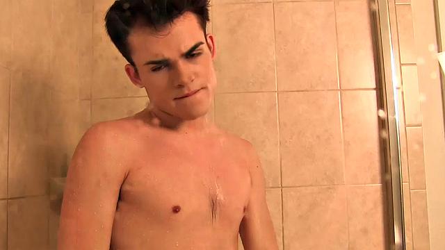 We look in on cute 18 year old Andy Rich as he strips naked and hops in the shower. Teasing us with his youthful sexuality, the twink slides his hands along his smooth body, soaping it up and rinsing off.