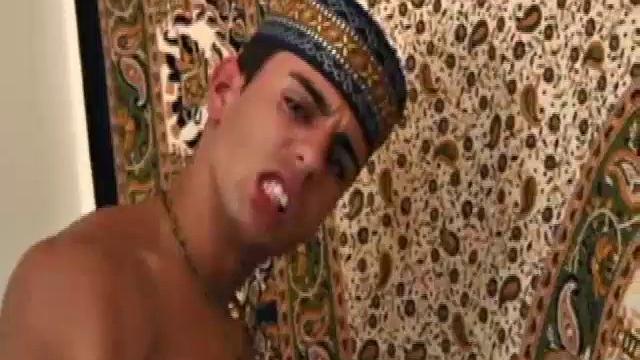 Najib is built like a brick shithouse and packs a monster in his pants. The muscular Latino massages his muscles before stripping naked and unveiling an impressive cock.