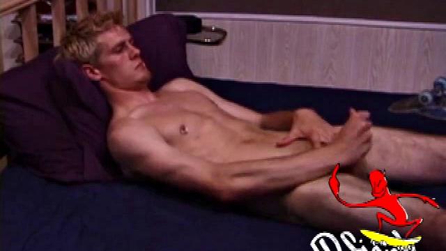 Lip pierced skater boy Jonathan Priest comes home from a day of hard skateboarding to enjoy some porn. He reveals pierced nipples, hairy legs, big balls, and a long hard cock.