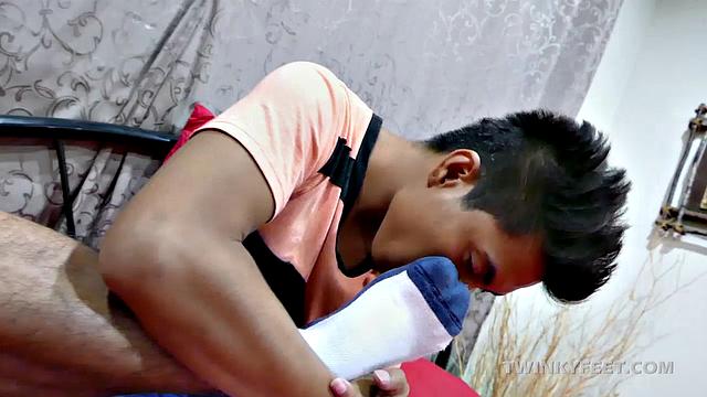 If you love gay Asian twinks, Josh is probably going to make you cum over and over again. His Asian male feet are near perfection. He slips off his shoes and buries his face into them while taking a long sniff of his sweaty casuals.