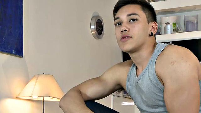 Our featured solo boy of the week is a buffed out young man who quickly makes sure we know he's spent some time in the gym. Nathan slowly strips and flexes until he's finally naked and showing off his big uncut.