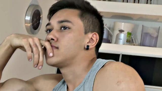 Our featured solo boy of the week is a buffed out young man who quickly makes sure we know he's spent some time in the gym. Nathan slowly strips and flexes until he's finally naked and showing off his big uncut.