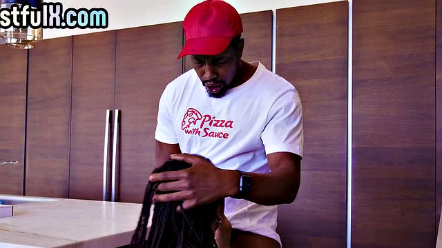 Zestful black babe throating BBC before doggystyle in the kitchen