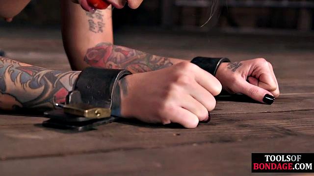 Mouth-gagged bitch gets dildo-fucked