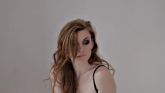 Handcuffs Torn Hose and Twin Cascades of Hair