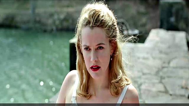 Blonde celebrity Riley Keough gets naughty in public with a topless bra-clad scene