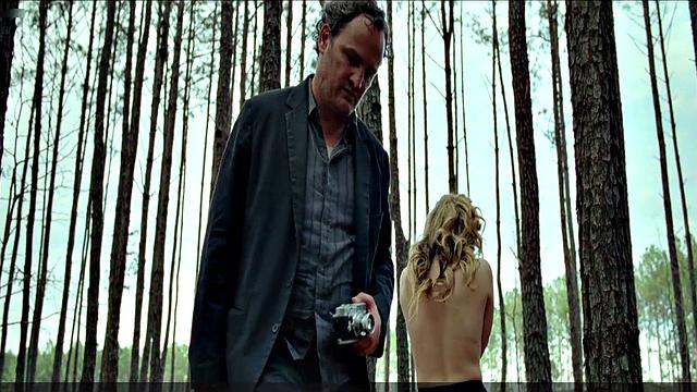 Blonde celebrity Riley Keough gets naughty in public with a topless bra-clad scene