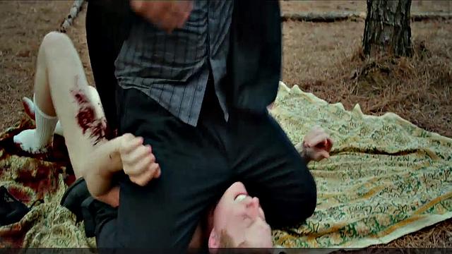 Blonde celebrity Riley Keough gets naughty in public with a topless bra-clad scene