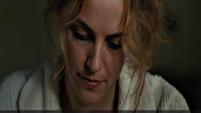 Blonde celebrity Riley Keough gets naughty in public with a topless bra-clad scene