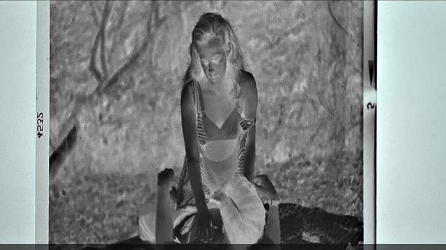 Blonde celebrity Riley Keough gets naughty in public with a topless bra-clad scene