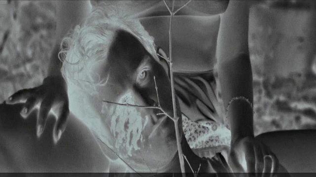 Blonde celebrity Riley Keough gets naughty in public with a topless bra-clad scene