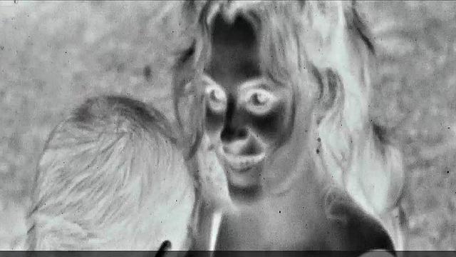 Blonde celebrity Riley Keough gets naughty in public with a topless bra-clad scene