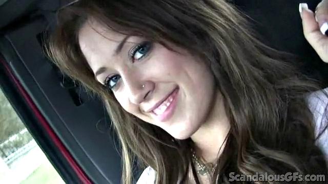 Brunette hottie enjoys a car ride with her boyfriend and shares a smile