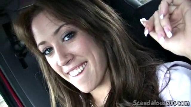 Brunette hottie enjoys a car ride with her boyfriend and shares a smile