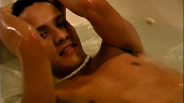 21 year old Latin boy performs a hot strip tease, bath tub fun, and serious cock stroking