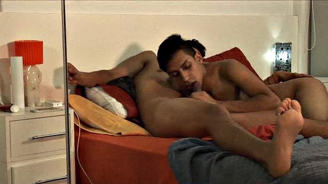 We join these two young Latinos making out on the bed, and by the time both are stripped to their underwear, Jonas pulls his big uncut dick out for Alejo to suck on.