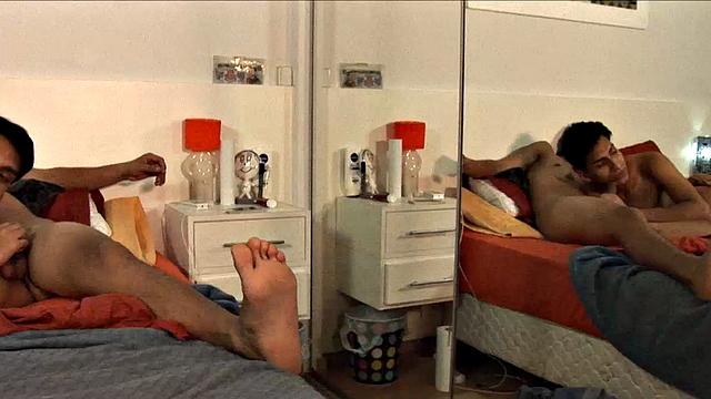 We join these two young Latinos making out on the bed, and by the time both are stripped to their underwear, Jonas pulls his big uncut dick out for Alejo to suck on.