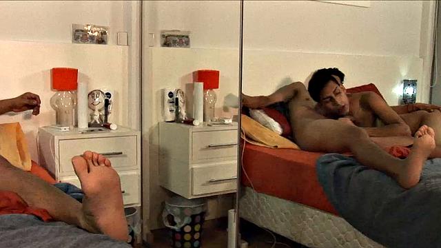 We join these two young Latinos making out on the bed, and by the time both are stripped to their underwear, Jonas pulls his big uncut dick out for Alejo to suck on.