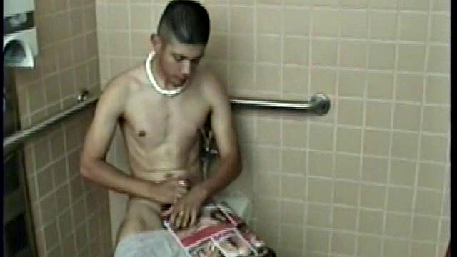 Straight boy Ethan needs to relieve the pressure. So, he goes into a public toilet to jack off.