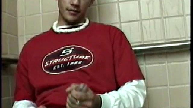 Straight boy Ethan needs to relieve the pressure. So, he goes into a public toilet to jack off.