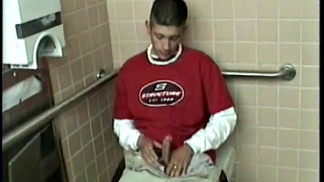 Straight boy Ethan needs to relieve the pressure. So, he goes into a public toilet to jack off.