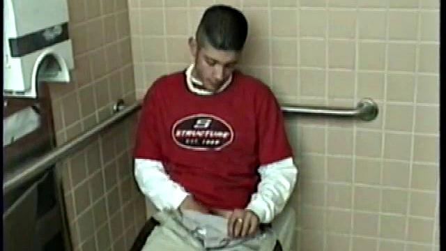Straight boy Ethan needs to relieve the pressure. So, he goes into a public toilet to jack off.