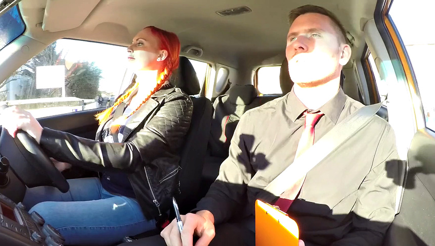 Redhead Examiner fingers her hairy pussy while instructing in car POV