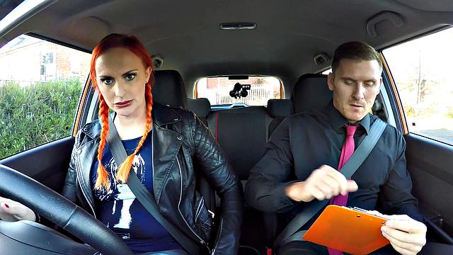 Redhead Examiner fingers her hairy pussy while instructing in car POV