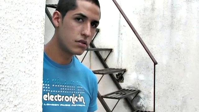 Carlos spots Anguel beating off to a porn magazine and decides to join him. Seated next to each other, with pants off and cocks hard, it isn't long before the magazine is no longer required.