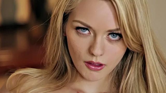 Blonde with small tits enjoys fingering her bald pussy in lingerie & high heels