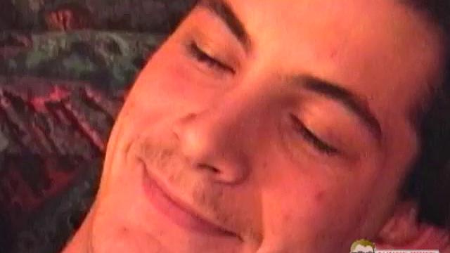 Brad is a tall 19 year old, with dark hair and a whopping 9 inches swinging between his legs. This solo jerk off scene opens with Brad on the bed, wearing nothing but his boxers, and in no time that monster cock is hanging out of the fly.