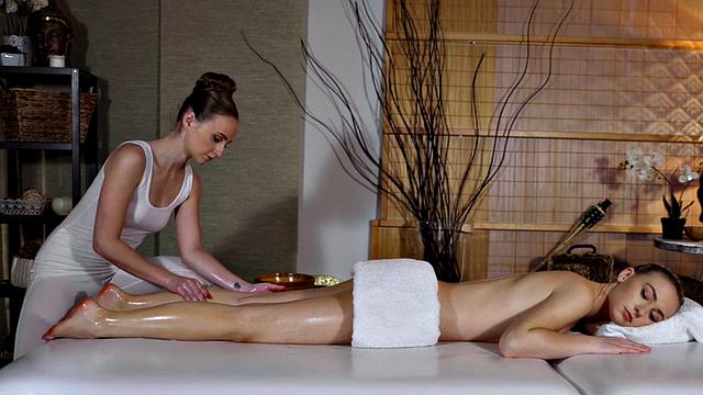 Watch these kinky dykes massage each other's oiled-up pussies and fingers