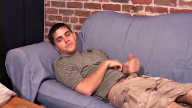 While T.J. Kummings strokes his hard cock on the sofa, he lets a helping hand plug up his butt with dildos. Butt play turns to cock play, as he gets a hand job and blows a big warm load.