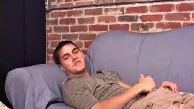 While T.J. Kummings strokes his hard cock on the sofa, he lets a helping hand plug up his butt with dildos. Butt play turns to cock play, as he gets a hand job and blows a big warm load.